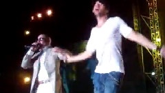 Enrique And Pitbull PerformAt Santo Domingo Show