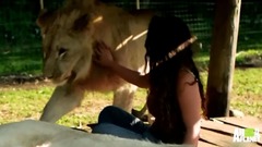 Lions Treat Woman Like the Leader of the Pride