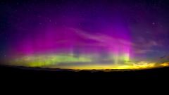 Noctilucent Clouds and Aurora