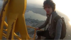 Russians Climb Feet Bridge