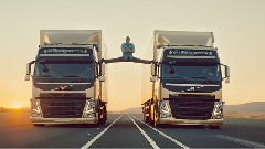 Jean Claude Van Damme Does Epic Split Between 2 Reversing Trucks