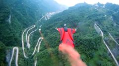 Jeb Corliss Flies Through Tianmen Cave